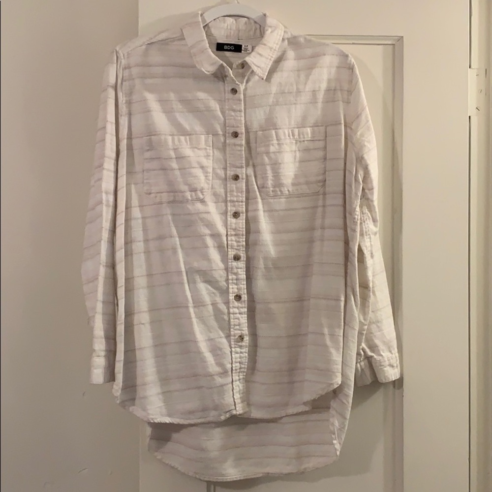 White flannel with subtle beige stripes.